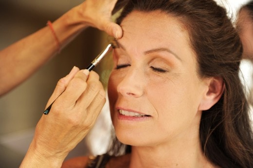 Bride getting makeup done